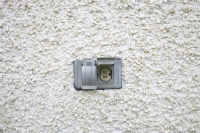 how to install a junction box in stucco|plug in electrical through stucco.